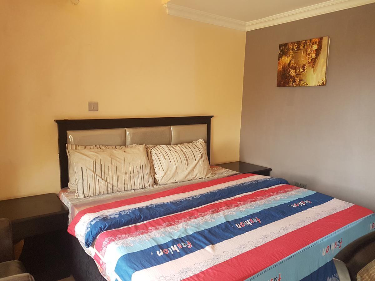 Grand Bank Link Hotel Otta Luaran gambar