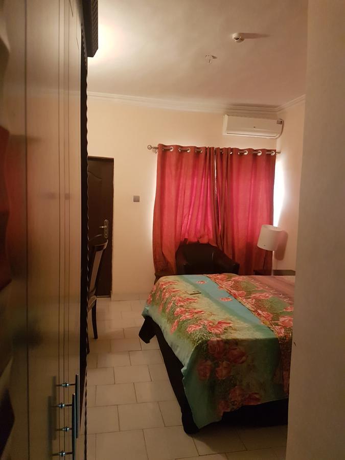 Grand Bank Link Hotel Otta Luaran gambar